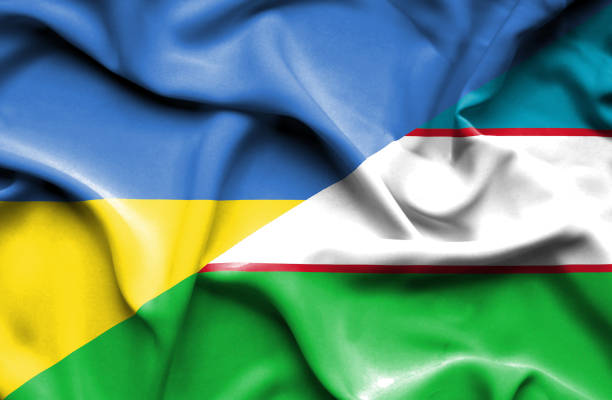 istock Waving flag of Uzbekistan and Ukraine 670320318