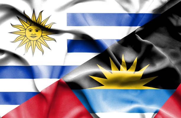 istock Waving flag of Antigua and Barbuda and Uruguay 670320394
