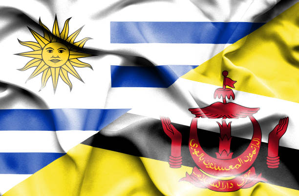 istock Waving flag of Brunei and Uruguay 670320486