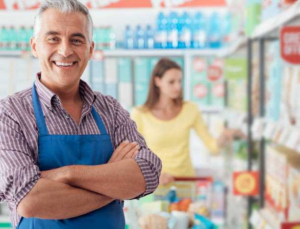 istock Supermarket clerk portrait 670326760