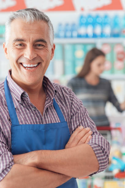 istock Supermarket clerk portrait 670326800