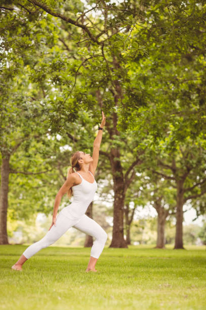 istock Woman exercising with hand raised 670333640