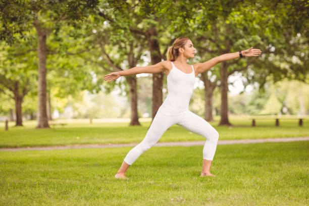 istock Woman exercising with arms outstretched 670333936