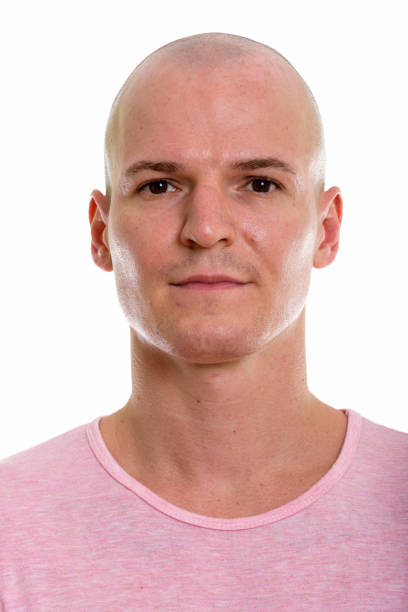 istock Face of young handsome bald man 670353190
