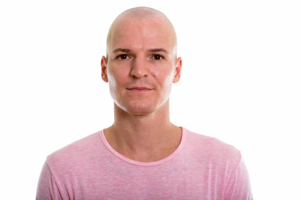istock Studio shot of young handsome bald man 670353298