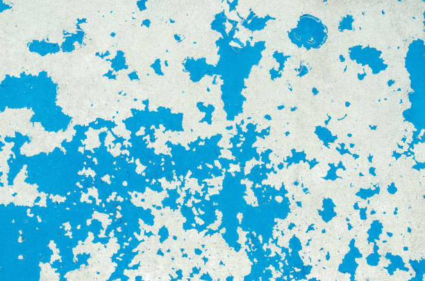 istock Texture of a bright blue cracked paint on an old suffered a metal surface 670353742