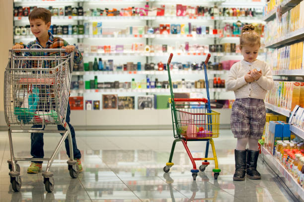 istock Kids in supermarket 670364324
