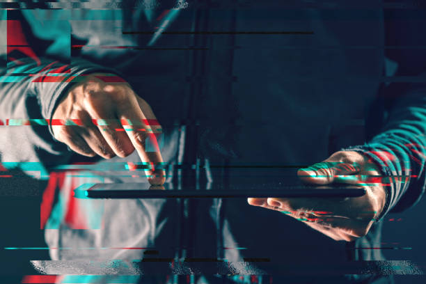 istock Digital tablet computer in male hands in dark room 670366934