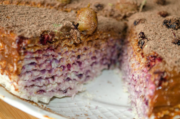 istock Puff cake with currant jam and chocolate powder 670379024
