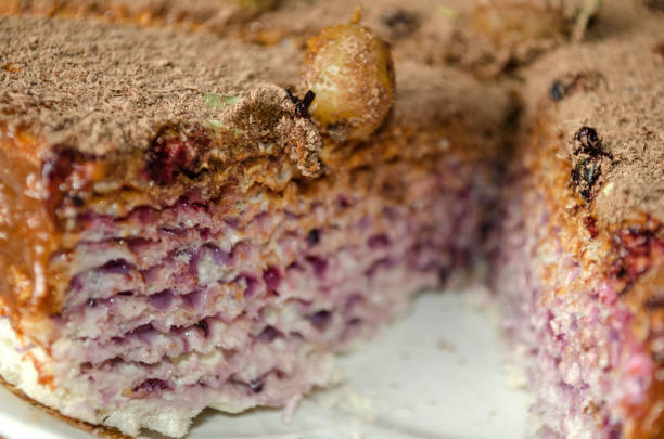 istock Puff cake with currant jam and chocolate powder 670379034