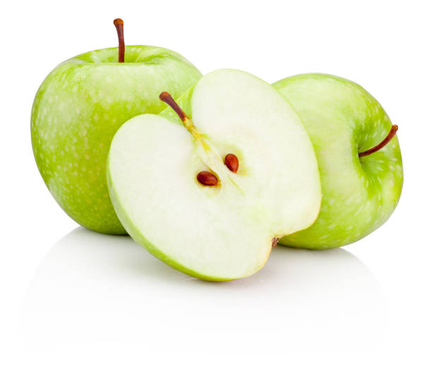 istock Ripe green apples and half isolated on a white background 670383338