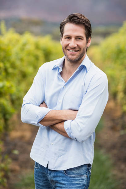 istock Happy vintner with crossed arms 670386216