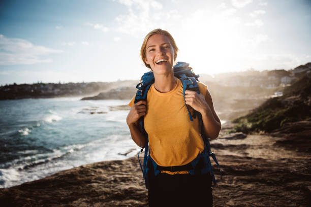 istock Succesfull hiker by the ocean shore 670387062