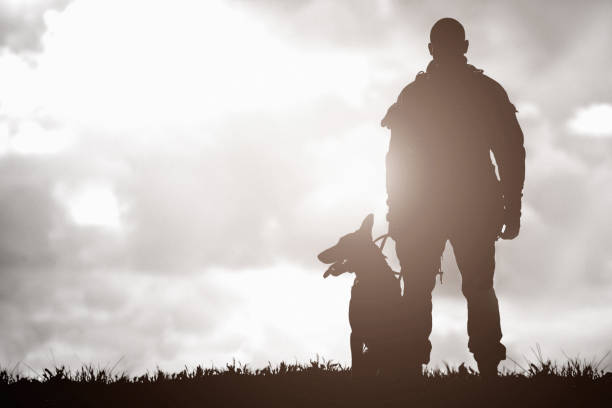 Silhouette of man and his dog