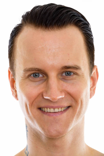 istock Face of happy young handsome man smiling 670391104