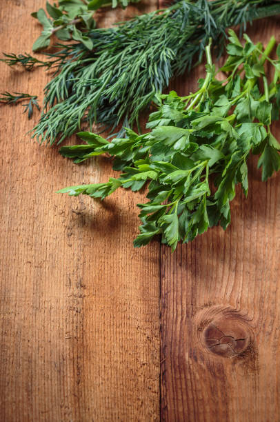 istock Spicy herb marjoram on a wooden table 670394626