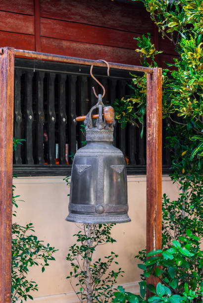 istock Ancient Metal Bell Hanging in Buddhism Temple 670398556