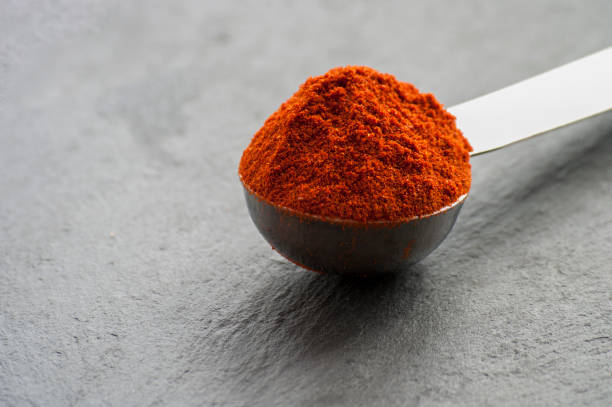 istock Powdered pimienta roja red pepper pile 670398778