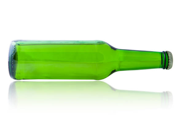 istock green bottle with beer isolated on white background 670401590