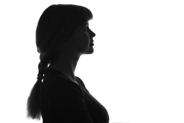 istock Profile portrait oof a young woman looking up 670403046
