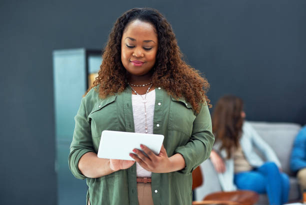 istock Keeping track of her team’s tasks 670406462