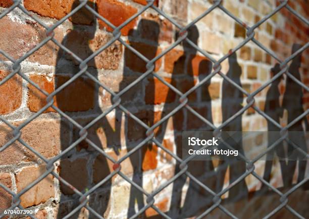 People Shadows Stock Photo - Download Image Now - Prison, Refugee, Child