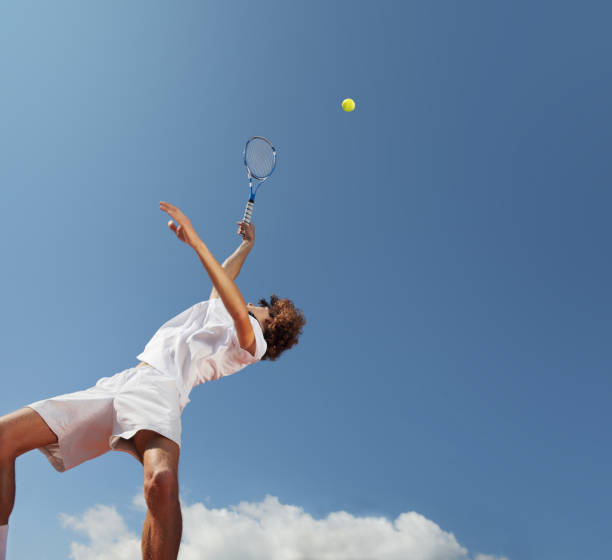 istock tennis player with racket during a match game 670407714