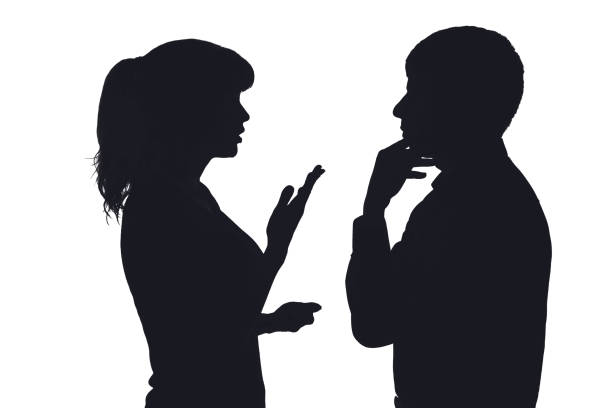istock Silhouette of a couple discussing family problems 670407896