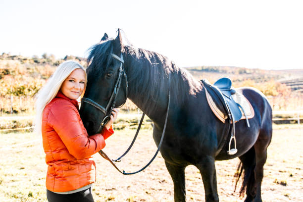 istock Woman Devoted To Her Horse 670411640