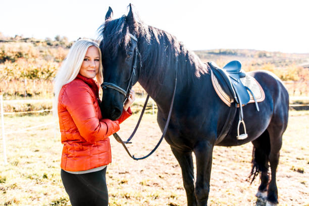 istock Woman Devoted To Her Horse 670411648