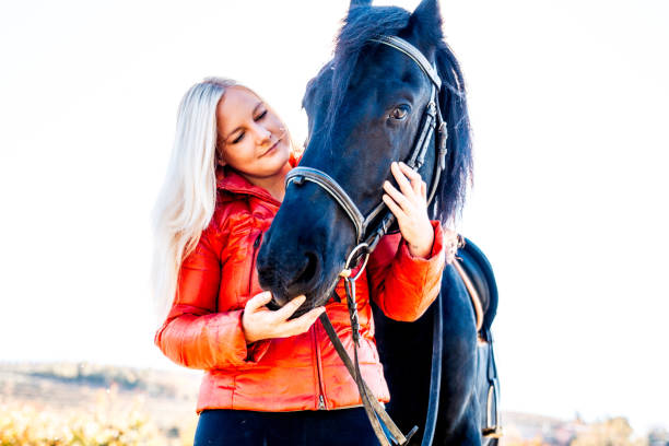 istock Connection Between Woman And Horse 670411654