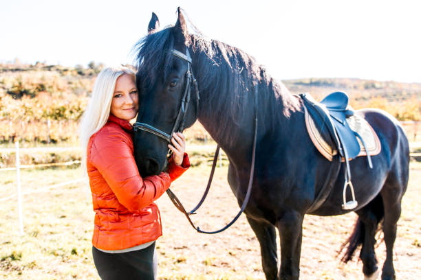 istock Connection Between Woman And Horse 670411660