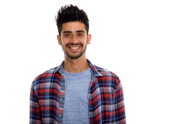 istock Studio shot of young happy Persian man smiling 670417486