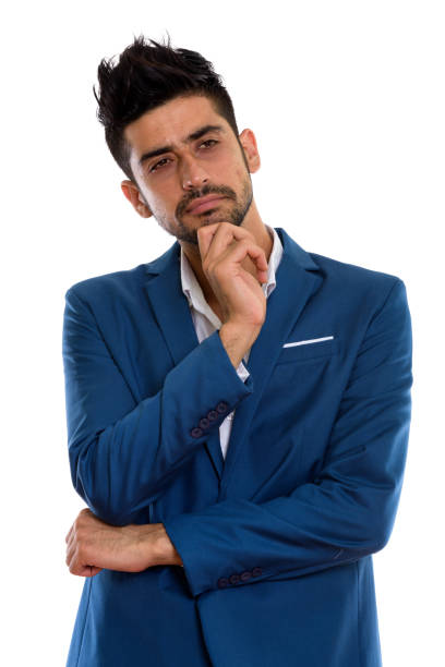 istock Studio shot of young Persian businessman thinking 670418184