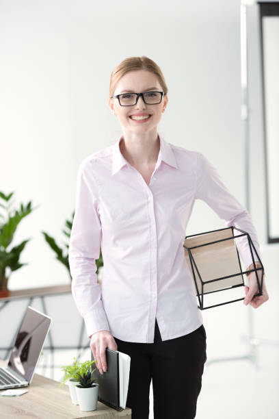 istock Young businesswoman in office 670421416