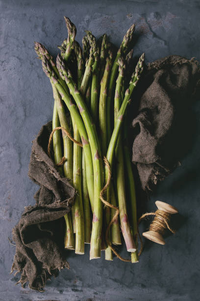istock Bundle of young green asparagus 670421510