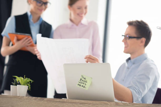 istock Young businesspeople working together 670421640