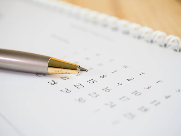 istock Pen put on calendar desk 2 670426780