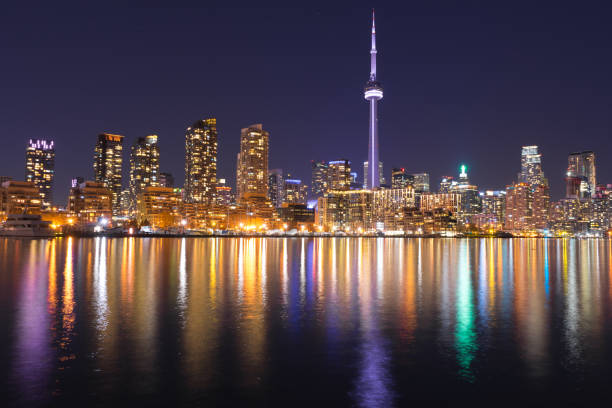 istock Toronto night city skyline with colorful water reflections 670427090