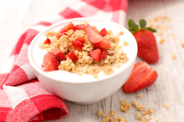 istock breakfast with yogurt,muesli and strawberry 670435674