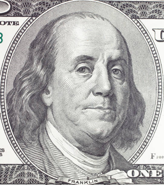 istock Franklin Benjamin portrait on dollar bill closeup 670436052