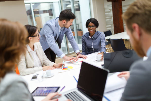 istock Business partners discussing documents and ideas at meeting 670440450