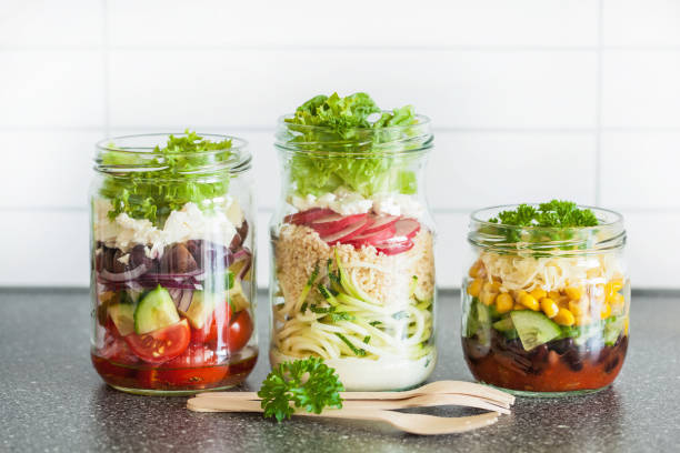 istock healthy vegetable cheese salad in mason jars 670441474