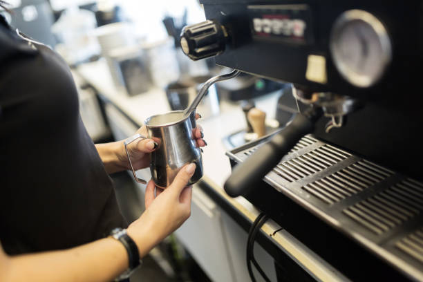 istock Professional barista preparing coffee with coffee machine 670441710