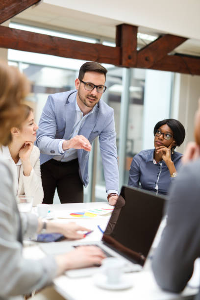 istock Business partners discussing documents and ideas at meeting 670441982