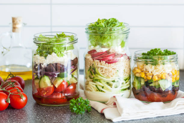 istock healthy vegetable cheese salad in mason jars 670442160