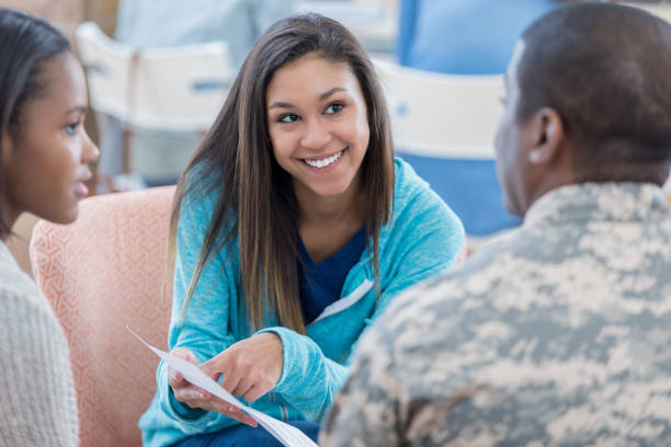 istock High school student talks with military recruitment officer 670449480