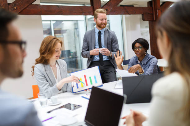 istock Business partners discussing documents and ideas at meeting 670449496