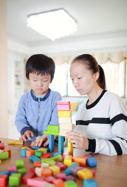 istock Cute asian Children playing with blocks 670463794