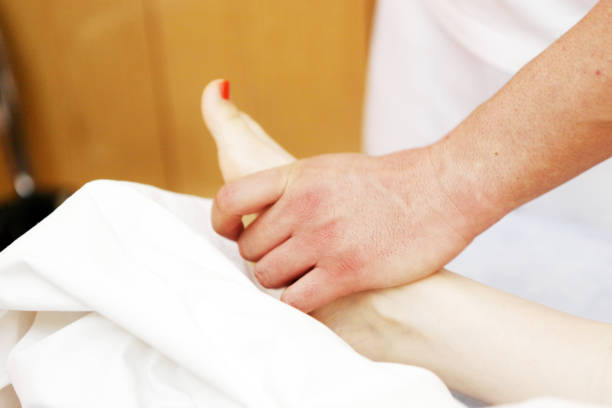 istock Foot massage in the spa salon 670463910